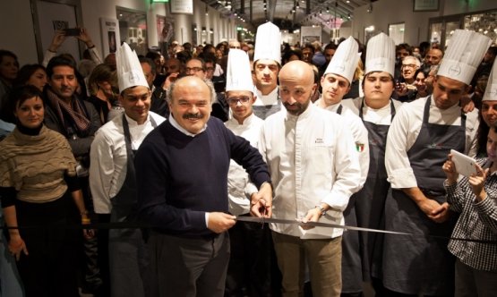 Niko Romito with Oscar Farinetti during the opening of the second Spazio at Eataly Roma, in November 2014