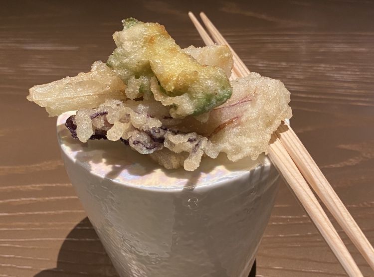 The vegetable tempura served on the side 
