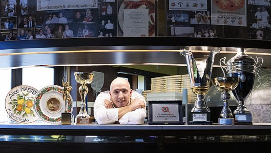 Cristian Marasco behind the counter of his La Gr