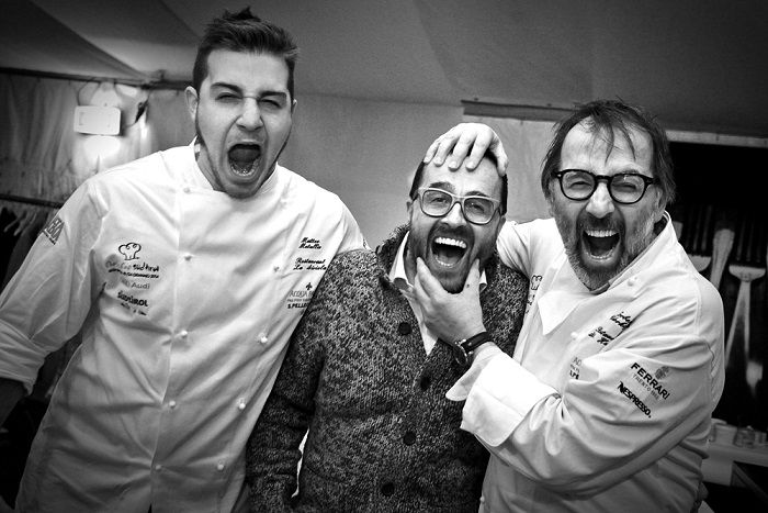 Matteo Metullio, Giancarlo Morelli e Norbert Niederkofler fotografati da Daniel Töchterle durante un momento ludico di un'edizione della Chef's Cup in Alta Badia