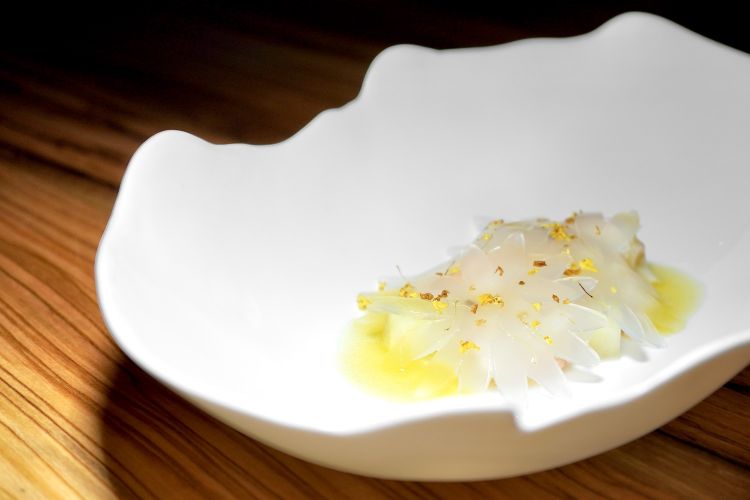 Flowers of osmanthus and scampi, second service: cold sauce of flowers of osmanthus, gel of green apple
