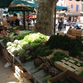 The beautiful stands in the Place de Lices market, open on Tuesdays and Saturdays until 1 pm
