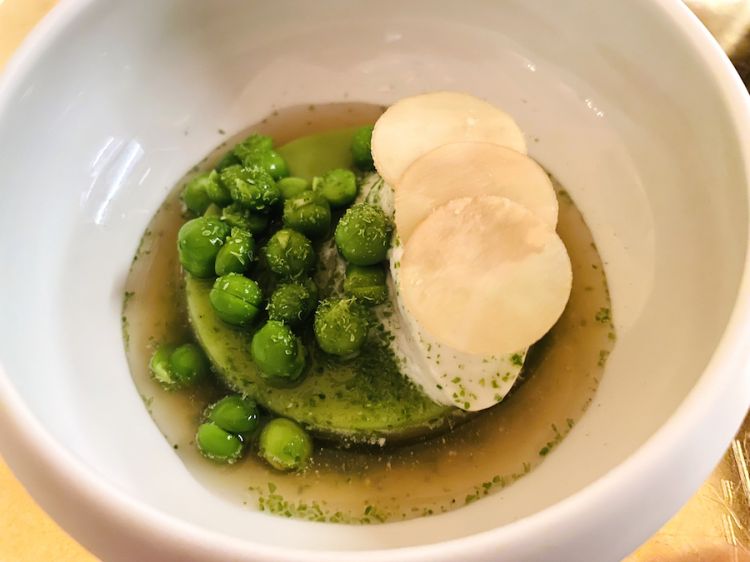 Pea panna cotta and wasabi with roasted onion broth and horseradish sorbet