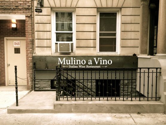 Mulino a Vino’s sign, with the typical staircase leading to the entrance