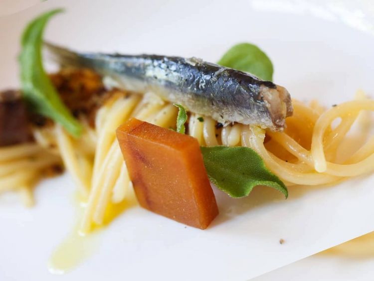 Spaghetti with butter, lemon marmalade from Sorrento, anchovy colatura, marinated anchovies, ficoide salad and avgotaraco from Roberto Conti, Rc Resort in Mortara (Pavia)
