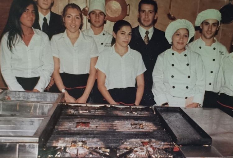An old photo of Matias Perdomo who first started as a cook in Uruguay, fourth from the left, in the second row
