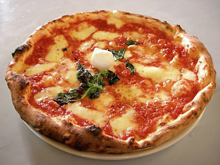 Pizza Margherita, the most famous pizza in the world, in a photo by Valerio Capello on Wikipedia

