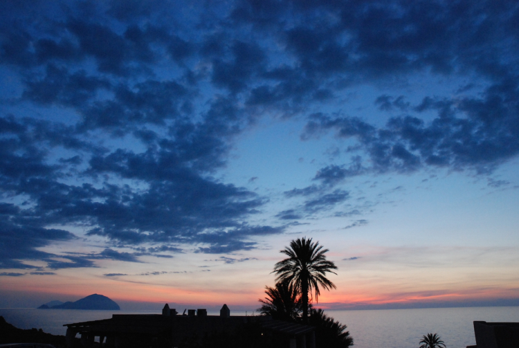 Sunset in Pollara, with Filucudi and Alicudi in th