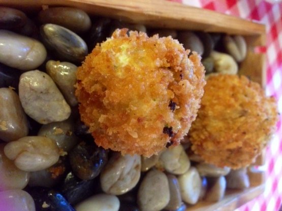 Ricotta meatballs with beets and mussels, courgette fritters