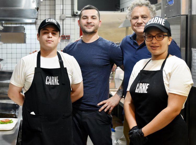 Rafaèl Lima, president at CARNE, with some of the staff. In the middle, Ezequiel Viqueira, ex Four Seasons, dining room director in Calle Defensa, in the centre of Buenos Aires
