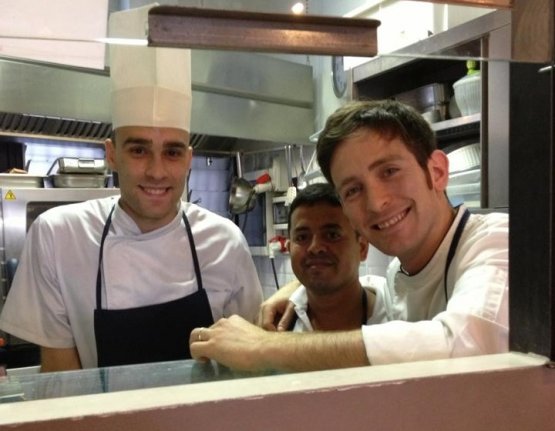Riccardo Orfino, on the right, in the kitchen of L