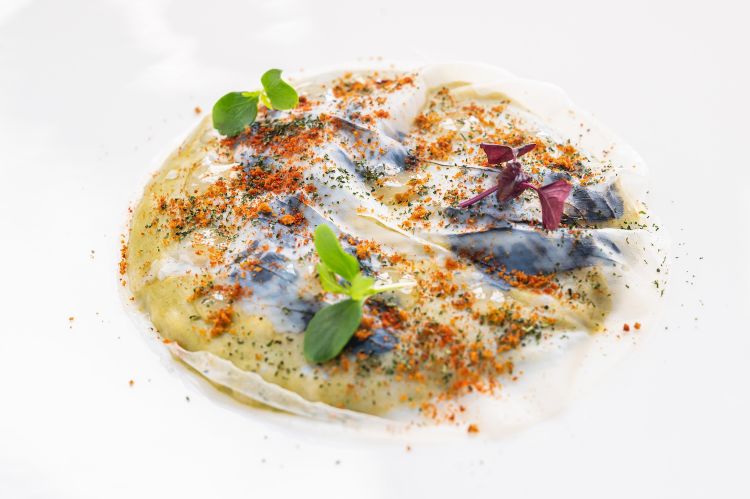 Risotto con seppie, tenerumi e peperone crusco di 