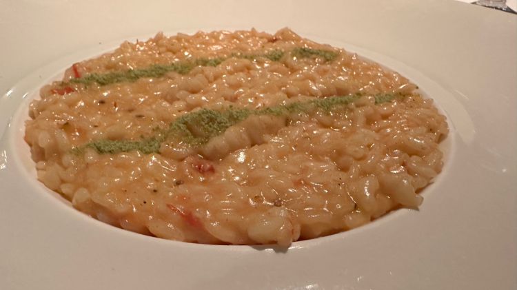 Risotto con gamberi e polvere di prezzemolo
