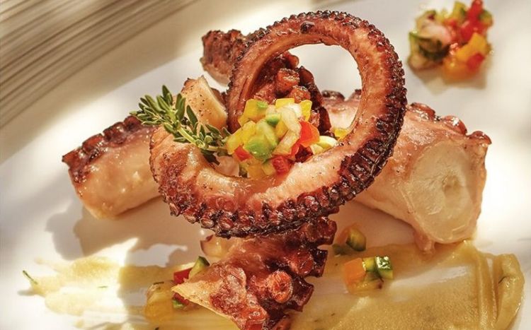 One of Abbate’s dishes: Roasted octopus, salted lemon marmalade, olives and potatoes
