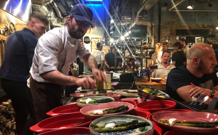 Federico Sisti while dishing out the sides for Peposo di guancia
