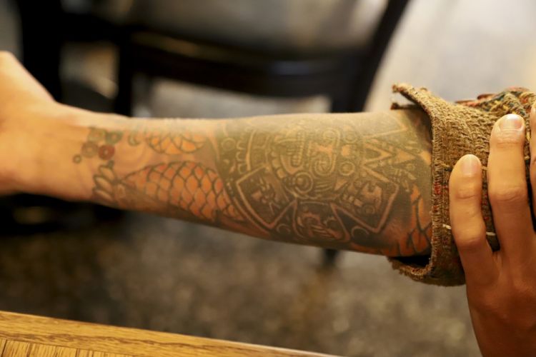 The chef’s tattoos: these are all pre-Columbian symbols 
