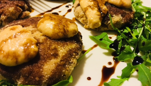 Tortino di porcini con fonduta di parmigiano