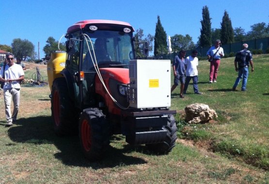 A tractor equipped with a prototype to spread ozoned water