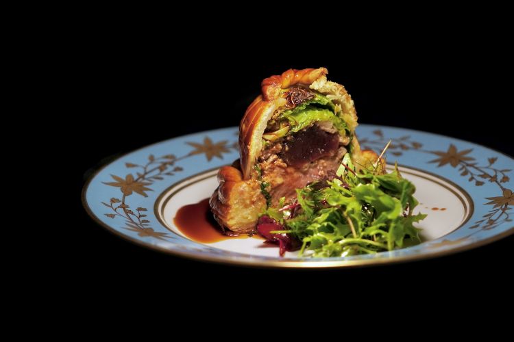 Lamb pithivier stuffed with foie gras, savoy cabbage and quince in syrup. All photos of the dishes are by Tanio Liotta