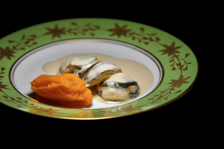 Lobster cooked in butter at 62°C for 25 minutes, sauce with Marsala De Bartoli and tarragon extract, caper leaves, pumpkin puree