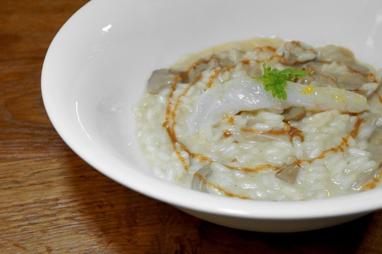 Risotto Carnaroli, porcini dell'Etna, crema di nocciole, scampo crudo, arancia candita
